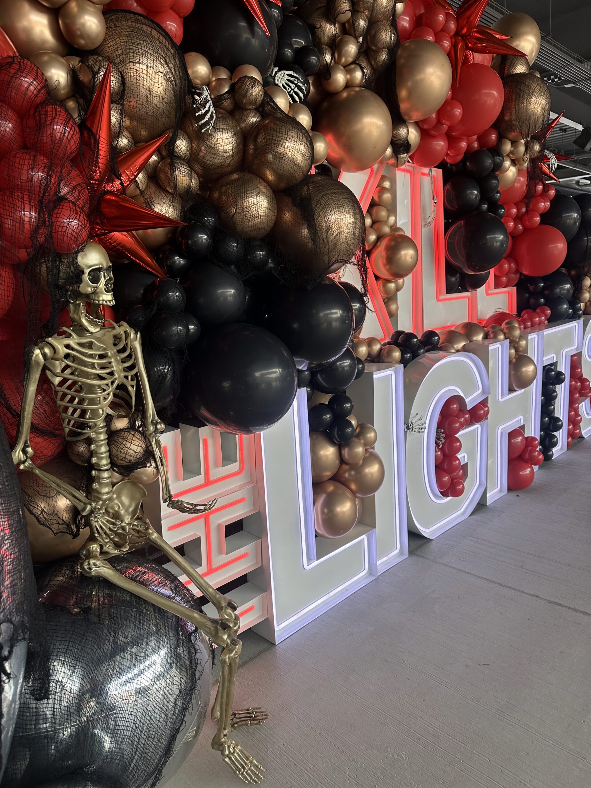 Kill The Lights Red, Black, Gold, Skeleton, Marquee Signage and Balloon Display