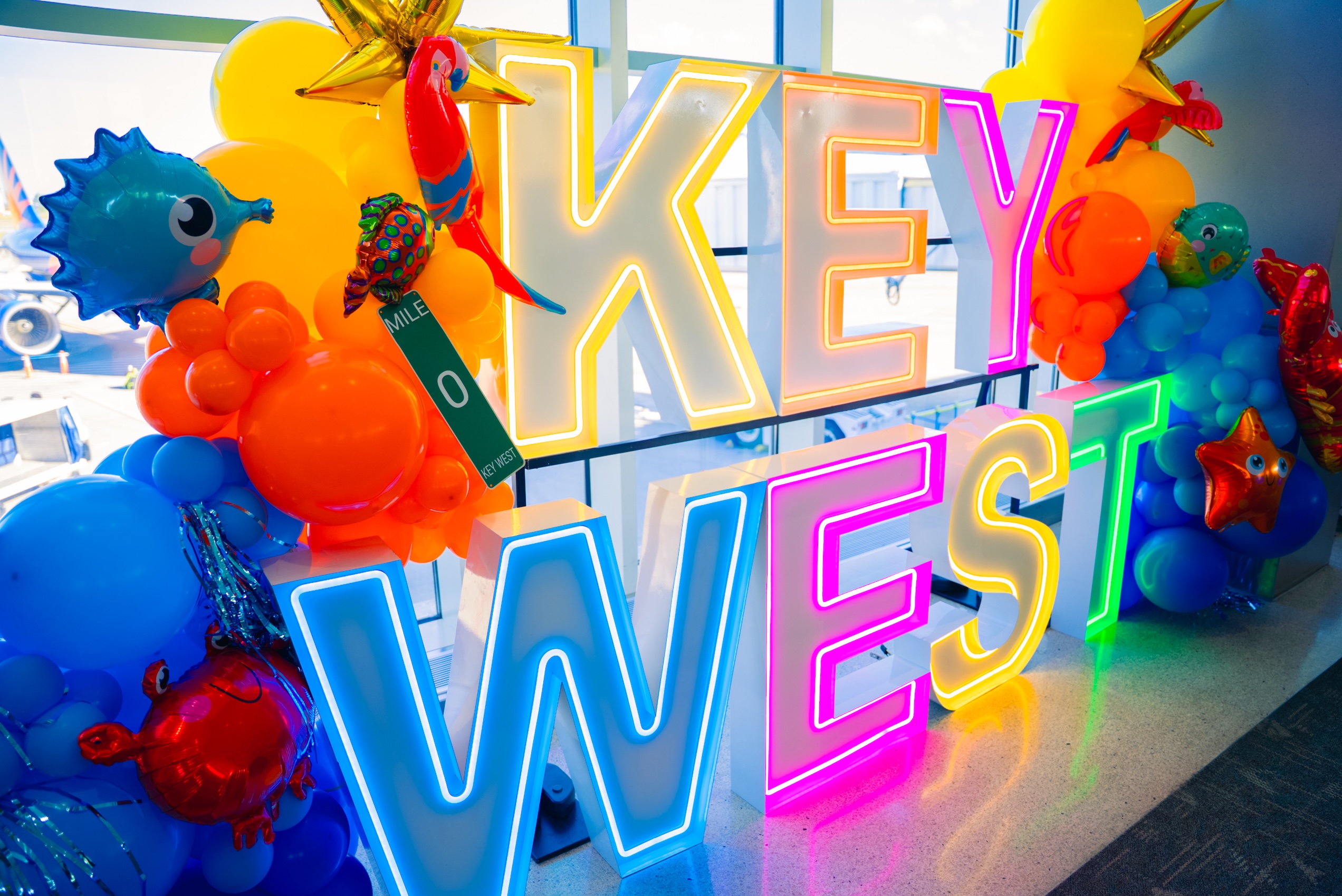 Key West Marquee Signage with Tropical Balloons Display